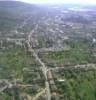 Photos aériennes de "Plan" - Photo réf. 051355 - Vue d'ensemble de la ville avec l'glise et le cimetire, avec en arrire plan, l'entreprise SAM.