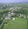 Photos aériennes de "Plan" - Photo réf. 054974 - Le village avec en arrire plan, la cimenterie.