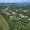 Photos aériennes de "Plan" - Photo réf. 055574 - Au premier plan : l'glise paroissiale Saint-Maurice datant du 17me sicle.