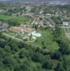 Photos aériennes de "parc" - Photo réf. 056170 - La ville possde un parc d'attractions avec piscine et tobogan en bordure de fort.