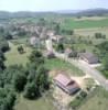 Photos aériennes de "village" - Photo réf. 15251 - Vue d'ensemble du village dans un beau vallon du Revermont.