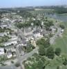 Photos aériennes de "chemin%E9e" - Photo réf. 17712 - Le vieux bourg. Au centre l'Abbaye, jouxtant la Mairie et l'glise Saint-Syphorien. En arrire plan le pont de chemin de fer.