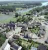 Photos aériennes de "Plan" - Photo réf. 17713 - Le vieux bourg avec au centre La Poste et la place de l'abb Thomas. En arrire plan La maine et le pont suspendu.