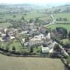 Photos aériennes de "romane" - Photo réf. 21377 - La place du bourg avec l'unique commerce du village et la trs belle petite glise romane.