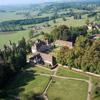 Photos aériennes de "ancien" - Photo réf. 22336 - Le chteau de Lugny, ancien chteau-fort qui trne sur une terrasse.