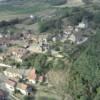 Photos aériennes de "la-haut" - Photo réf. 23113 - En haut du village est rige l'glise d'origine romane dont subsistent des modillons sculpts et les fonts baptismaux.