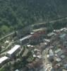 Photos aériennes de "Grand" - Photo réf. 9798 - Au fond d'une cluse composant un site curieux, Morez est un grand centre de production de lunette depuis 2 sicles. Dsenclave par d'audacieux viaducs, la ville s'tire sur prs de 3 km au fond de la valle de la Bienne.
