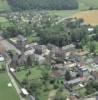 Photos aériennes de "église" - Photo réf. 33229 - Le centre du village avec son glise, sa mairie et sa halle.