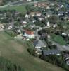 Photos aériennes de "centre" - Photo réf. A00621 - Le clocher de l'ancienne glise se dresse au centre du village.