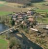 Photos aériennes de "village" - Photo réf. A01241 - Le pont sur la Saison mne au village.