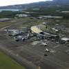 Photos aériennes de "aeroport" - Photo réf. N006283 - Le Boeing 747 F-GSEA de Corsair et un des deux Boeing 767 d'Aeris sont  leur passerelle d'embarquement.