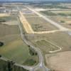Photos aériennes de "aerodrome" - Photo réf. N018330 - L'arodrome de Berlfort-Fontaine a t reconverti en Zone Industrielle.