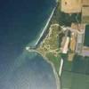Photos aériennes de "littoral" - Photo réf. N029198 - La Pointe du Hoc, situe sur la commune de Cricqueville-en-Bessin (Calvados), fut lgue aux Etats-Unis en 1979 en reconnaissance aux soldats tus lors de la deuxime guerre mondiale.
