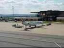 Photos aériennes de "aerodrome" - Photo réf. T040582 - Un Embraer 145 venant d'arriver au parking.