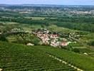Photos aériennes - Cultures céréales et vigne - Photo réf. T047950 - Le vignoble au premier-plan du village de Limony (Ardche).