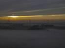 Photos aériennes de "eoliennes" - Photo réf. T082242 - Une nappe de brouillard laisse apparatre des oliennes au coucher du soleil (Meurthe-et-Moselle).