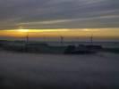  - Photo réf. T082243 - Une nappe de brouillard laisse apparatre des oliennes au coucher du soleil (Meurthe-et-Moselle).