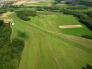Photos aériennes de "aerodrome" - Photo réf. T068800 - Un petit arodrome avec une piste en herbe se cache sur la photo.