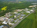 Photos aériennes de "activités" - Photo réf. T073880 - La zone industrielle de Dannemarie-sur-Crte dans le Doubs.