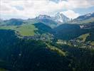 Photos aériennes de "Montagne" - Photo réf. U110381 - Il s'agit de la station de ski de Courchevel, situe sur les hauteurs de la commune de Saint-Bon-Tarentaise.