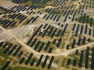 Photos aériennes de "energie" - Photo réf. U112211 - Le chantier d'installation de la plus puissante centrale photovoltaique du monde sur l'ancienne base arienne 136 de Toul-Rosires par EDF Energies Nouvelles au 1er Aot 2011.