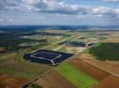 Photos aériennes de "energie" - Photo réf. U113123 - Le chantier d'installation de la plus puissante centrale photovoltaique du monde sur l'ancienne base arienne 136 de Toul-Rosires par EDF Energies Nouvelles au 29 Aot 2011.