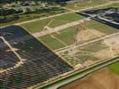 Photos aériennes de "energie" - Photo réf. U113125 - Le chantier d'installation de la plus puissante centrale photovoltaique du monde sur l'ancienne base arienne 136 de Toul-Rosires par EDF Energies Nouvelles au 29 Aot 2011.