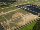 Photos aériennes de "EDF" - Photo réf. U113126 - Le chantier d'installation de la plus puissante centrale photovoltaique du monde sur l'ancienne base arienne 136 de Toul-Rosires par EDF Energies Nouvelles au 29 Aot 2011.