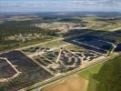 Photos aériennes de "electricité" - Photo réf. U115334 - Le chantier d'installation de la plus puissante centrale photovoltaique du monde sur l'ancienne base arienne 136 de Toul-Rosires par EDF Energies Nouvelles au 15 Septembre 2011.