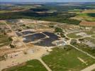 Photos aériennes de "electricité" - Photo réf. U115335 - Le chantier d'installation de la plus puissante centrale photovoltaique du monde sur l'ancienne base arienne 136 de Toul-Rosires par EDF Energies Nouvelles au 15 Septembre 2011.