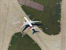 Photos aériennes de "LSGG" - Photo réf. E133253 - Le Boeing 777-21H(ER) immatricul A6-EMI de la compagnie Emirates.