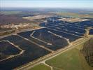 Photos aériennes de "electricité" - Photo réf. U115354 - Le chantier d'installation de la plus puissante centrale photovoltaique du monde sur l'ancienne base arienne 136 de Toul-Rosires par EDF Energies Nouvelles au 16 Janvier 2012.