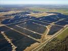 Photos aériennes de "electricité" - Photo réf. U115356 - Le chantier d'installation de la plus puissante centrale photovoltaique du monde sur l'ancienne base arienne 136 de Toul-Rosires par EDF Energies Nouvelles au 16 Janvier 2012.