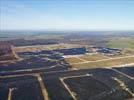 Photos aériennes de "EDF" - Photo réf. U115357 - Le chantier d'installation de la plus puissante centrale photovoltaique du monde sur l'ancienne base arienne 136 de Toul-Rosires par EDF Energies Nouvelles au 16 Janvier 2012.