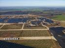 Photos aériennes de "EDF" - Photo réf. U115359 - Le chantier d'installation de la plus puissante centrale photovoltaique du monde sur l'ancienne base arienne 136 de Toul-Rosires par EDF Energies Nouvelles au 16 Janvier 2012.