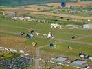 Photos aériennes de "travail" - Photo réf. E145949 - L'hlicoptre de l'Europe vue du ciel en plein travail de prises de vues ariennes autour des montgolfires du Mondial Air Ballons 2013.