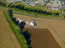 Photos aériennes de "travail" - Photo réf. E145954 - L'hlicoptre de l'Europe vue du ciel en plein travail de prises de vues ariennes autour des montgolfires du Mondial Air Ballons 2013.