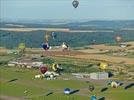 Photos aériennes de "LMAB" - Photo réf. E145956 - L'hlicoptre de l'Europe vue du ciel en plein travail de prises de vues ariennes autour des montgolfires du Mondial Air Ballons 2013.