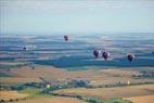 Photos aériennes de "montgolfière" - Photo réf. C157934 - Lorraine Mondial Air Ballons 2015 : Vol du Dimanche 26 Juillet le matin lors du Record Mondial de Dcollage en Ligne. (The Great Line, In-line Mass Ascent)