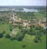 Photos aériennes de "Plan" - Photo réf. 055016 - Vue d'ensemble du village avec au premier plan, l'glise et au second une partie de l'etang.