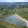 Photos aériennes de "étang" - Photo réf. 055336 - L'étang de Favières et sa plage attirent beaucoup de monde chaque été.