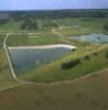 Photos aériennes de "étang" - Photo réf. 055338 - L'étang de Favières et sa plage attirent beaucoup de monde chaque été.