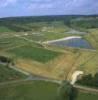 Photos aériennes de "étang" - Photo réf. 055339 - L'étang de Favières et sa plage attirent beaucoup de monde chaque été.