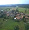 Photos aériennes de "siècle," - Photo réf. 055429 - Au centre du village : la collgiale de Munster construite au 14me et 15me sicle.