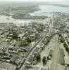 Photos aériennes de "Quartier" - Photo réf. 043827 - En premier plan, le cimetière ainsi que le quartier gare, et en second plan, le port de la ville avec ses remparts.