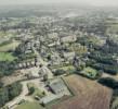 Photos aériennes de Audierne (29770) - Autre vue | Finistère, Bretagne, France - Photo réf. 719646 - Au premier plan, entreprises et HLM et en second plan, le port dans la ville.