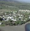 Photos aériennes de L'Étang-Salé (97427) - L'Etang-Salé-les-Bains | Réunion, Réunion, France - Photo réf. 11528 - Un village long par une plage de sable noir.