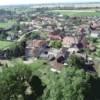 Photos aériennes de "lieu" - Photo réf. 15054 - Ancien bourg médiéval, ex-enclave de Bourgogne en terre comtoise, Chaussin, chef-lieu de canton, est un centre actif de commerces et de services.