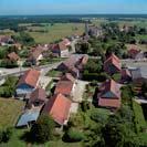 Photos aériennes de "deux" - Photo réf. 16307 - Au coeur du pays des tangs, Tassenires fut longtemps rput pour ses cramiques, qui sortaient de ses ateliers au rythme de deux millions de pices par an!