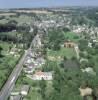 Photos aériennes de "verdure" - Photo réf. 17351 - Vue d'ensemble d'une commune au coeur de la verdure.